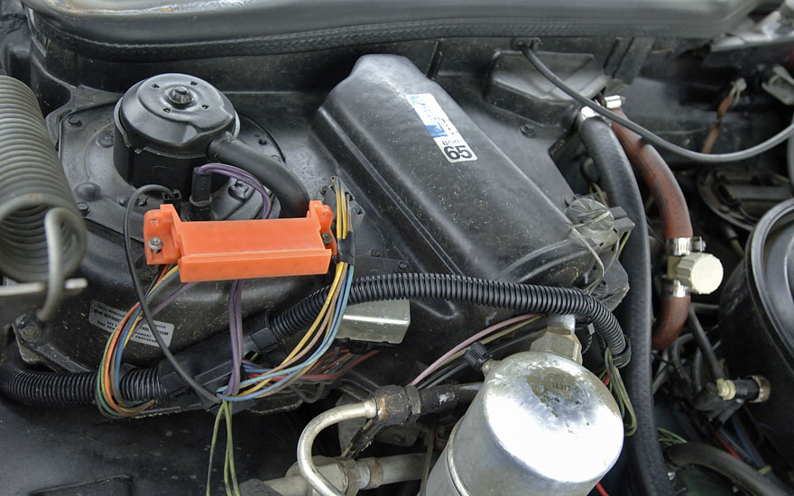 Engine bay is clean and all GM.  The car leaves a couple of drips on 